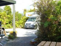 Tourist Rental Orange Sheep Campervan Park from Franz Josef Glacier, Westland, West Coast