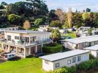 Tourist Rental Big Bay Holiday Park from Awhitu, Franklin, Auckland